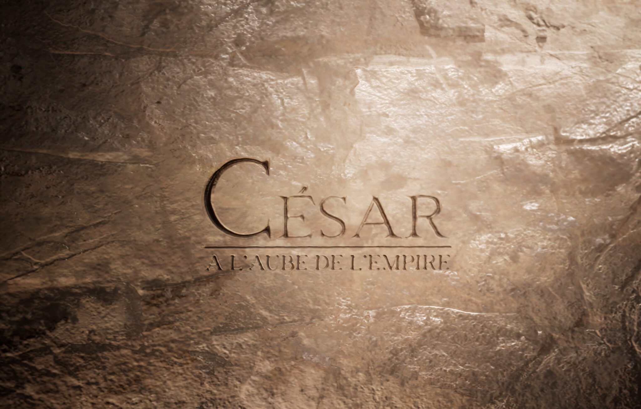 Inscription gravée dans la pierre, éclairée par un faisceau rasant : « César – À l’aube de l’Empire ».
